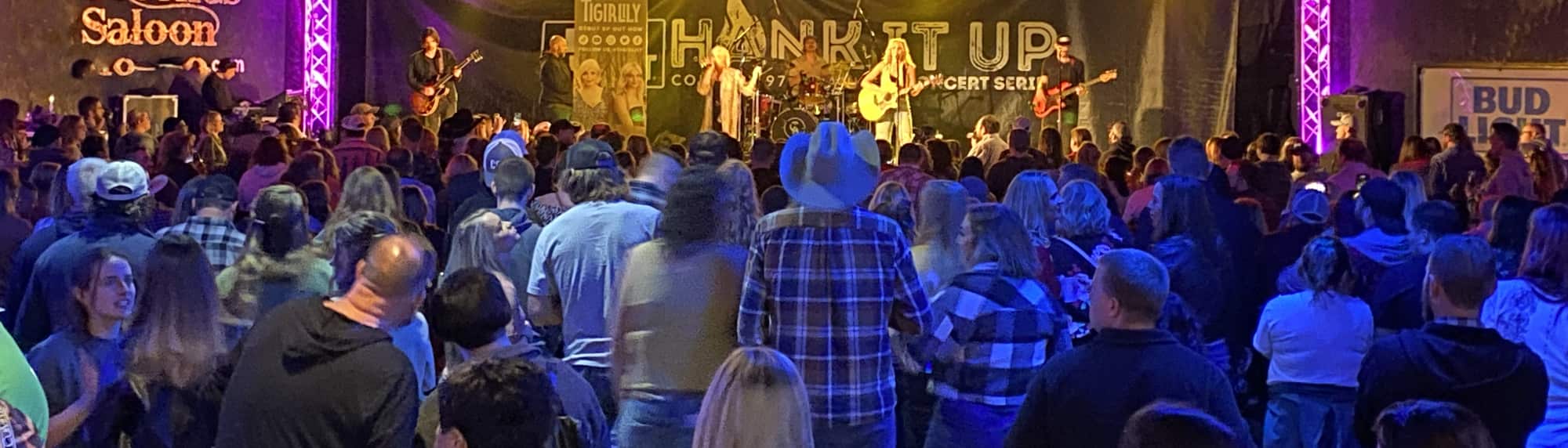 country concert with fans wearing cowboy hats San Jose